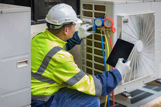 Professional Emergency Ac Repair technician working in Central Bridge, NY
